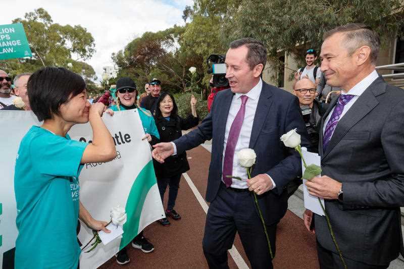 WA Premier Mark McGowan (centre) and WA Health Minister Roger Cook (right) outside WA Parliament House