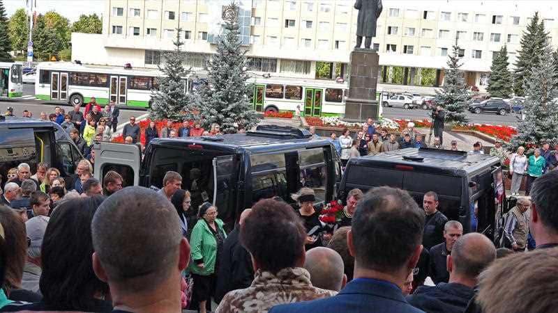 People gather for the funerals of five Russian nuclear engineers killed by a rocket explosion in Sarov
