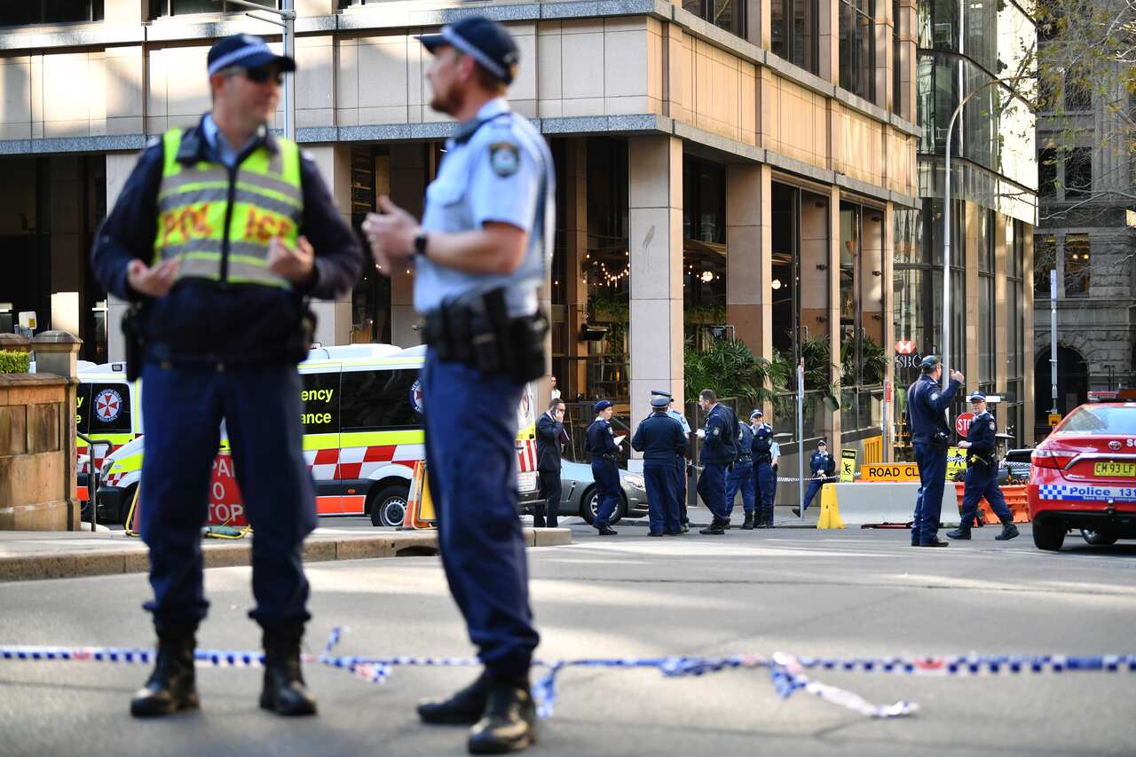 Police keep watch following the stabbing incident in Sydney's CBD.