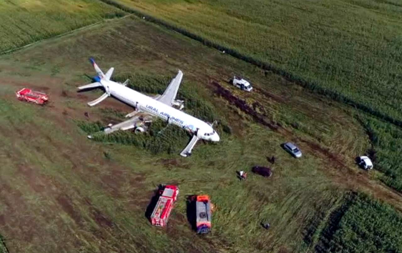 In this video grab provided by the RU-RTR Russian television, A Russian Ural Airlines' A321 plane is seen after an emergency landing in a cornfield near Ramenskoye