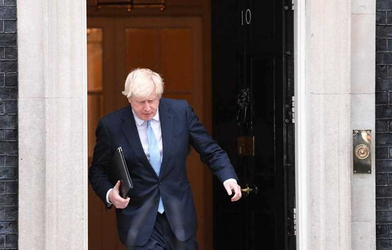 British Prime Minister, Boris Johnson arrives to deliver a statement outside 10 Downing street in Westminster, central London