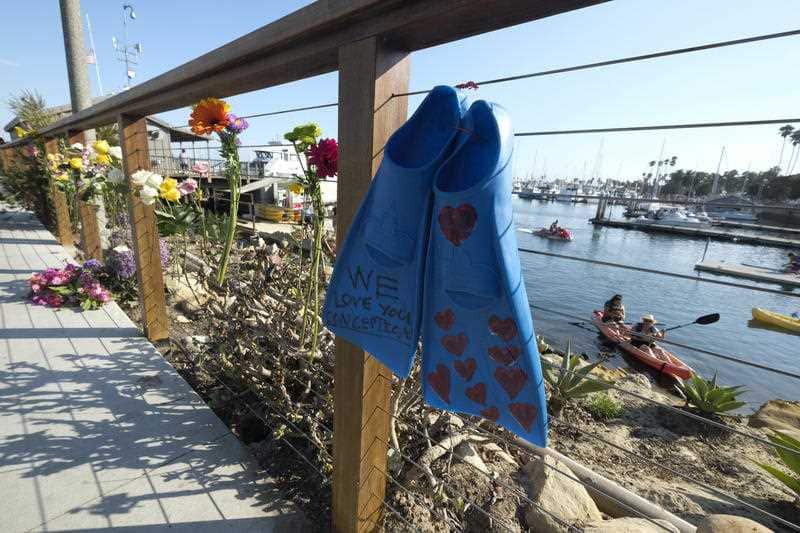 A memorial outside Truth Aquatics for the victims of the Conception boat fire