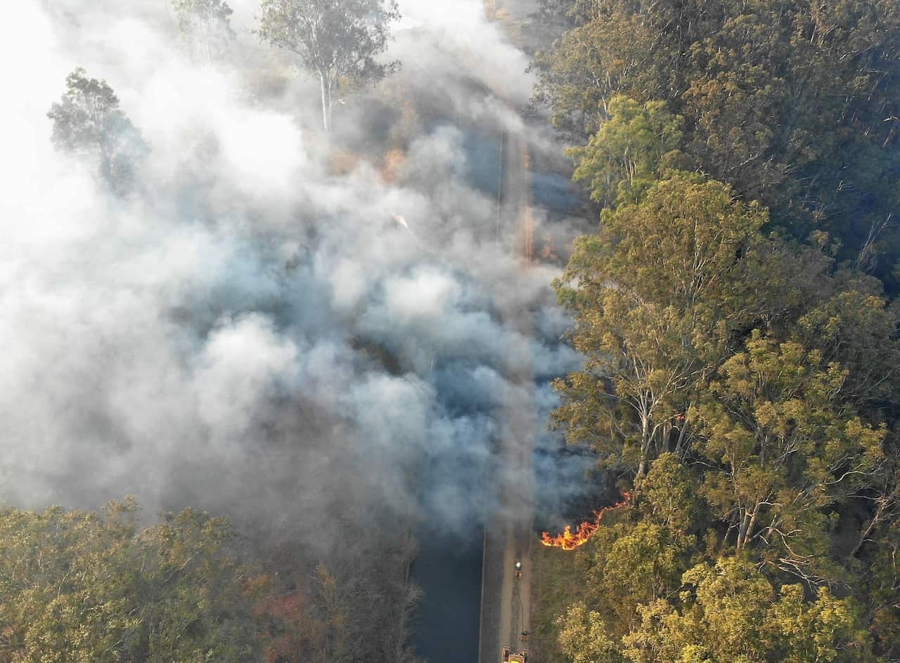 A bushfire burning in the far Northern Region near Northey Road, Tolga.