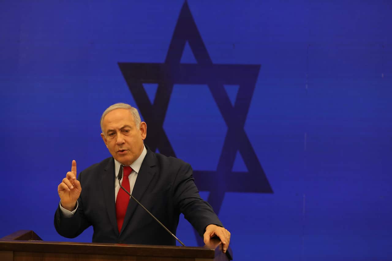 Israeli Prime Minister Benjamin Netanyahu delivers a statement in Ramat Gan near Tel Aviv.