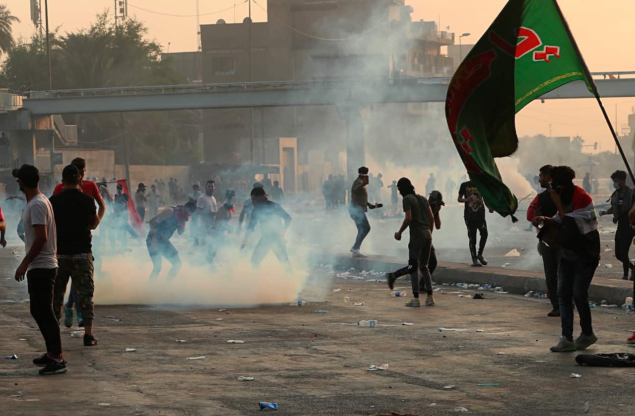Iraqi officials said several protesters have been killed Wednesday and scores injured amid gunfire and clashes in Baghdad.