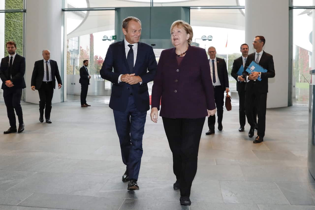 Chancellor Angela Merkel (R) receives President of the European Council Donald Tusk at the Federal Chancellery.