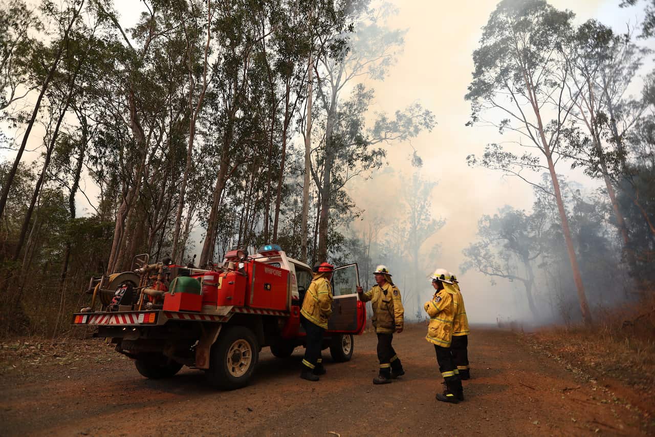 Fire crews worked around the clock to battle raging bushfires at Busbys Flat earlier this month.
