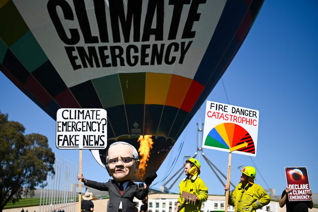 A Climate Change Emergency hot air balloon during a Climate Change rally outside Parliament House in Canberra.