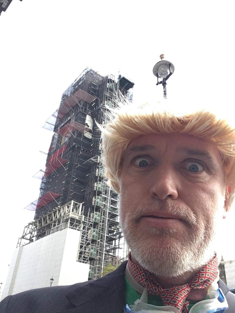 Extinction Rebellion protester Ben Atkinson prior to him climbing scaffolding surrounding Elizabeth Tower which houses Big Ben.