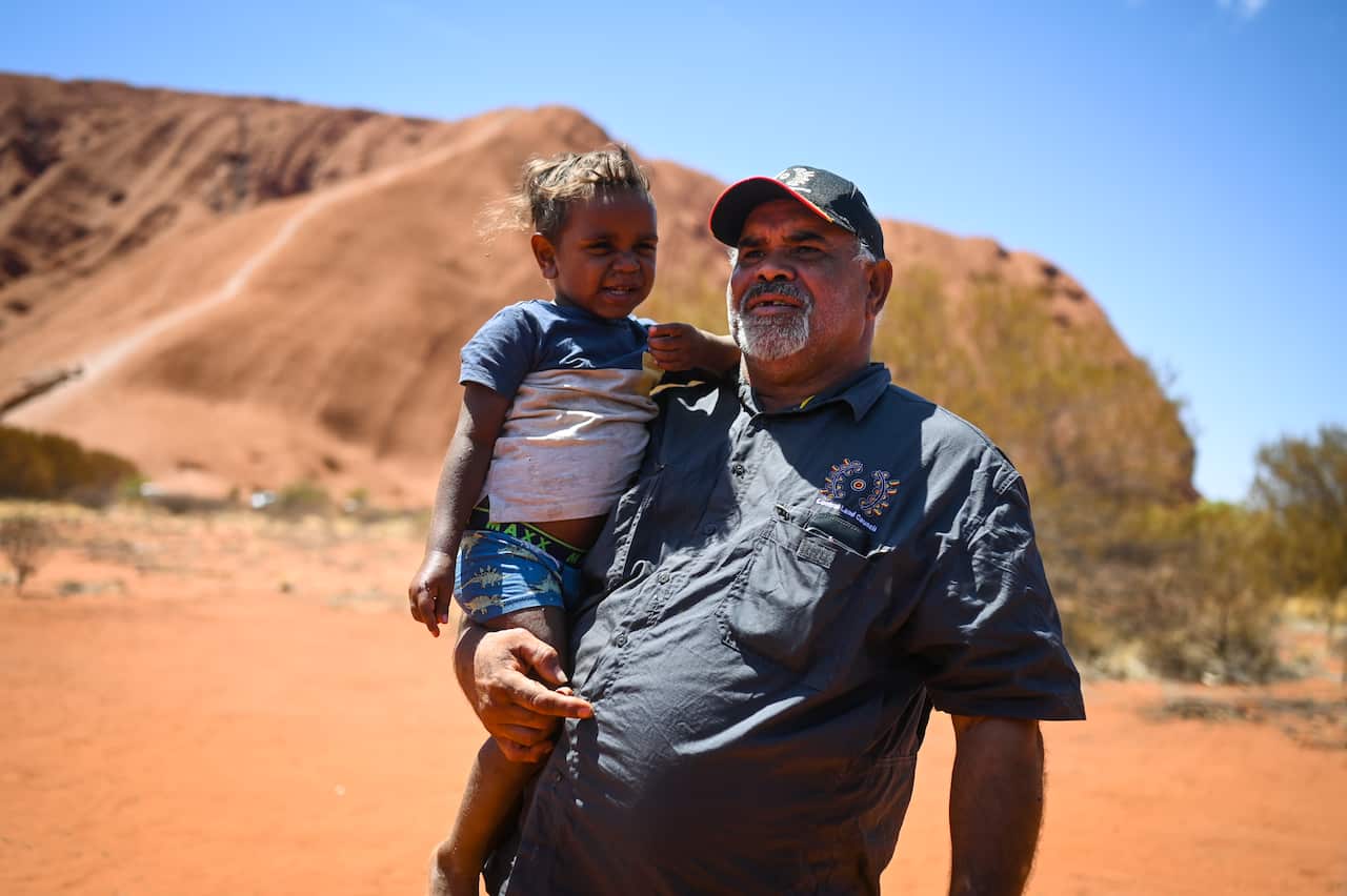 Sammy Wilson, chair of the Central Land Council and his grandson, Jacob.