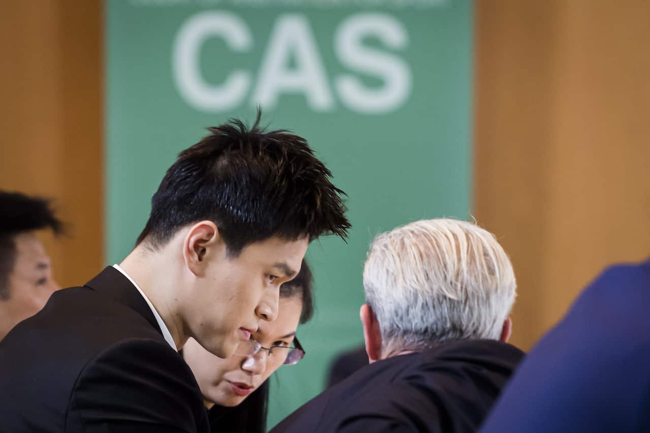 Chinese swimming star Sun Yang (L), reacts during the Court of Arbitration for Sport, (CAS) public hearing, in Montreux, Switzerland.
