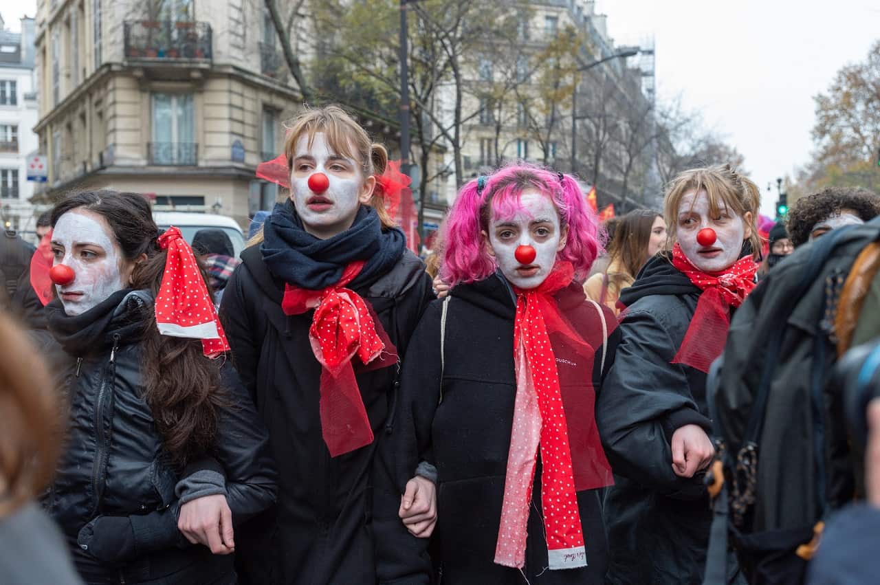 People take to the streets during a massive protest as part of a national general strike in Paris.
