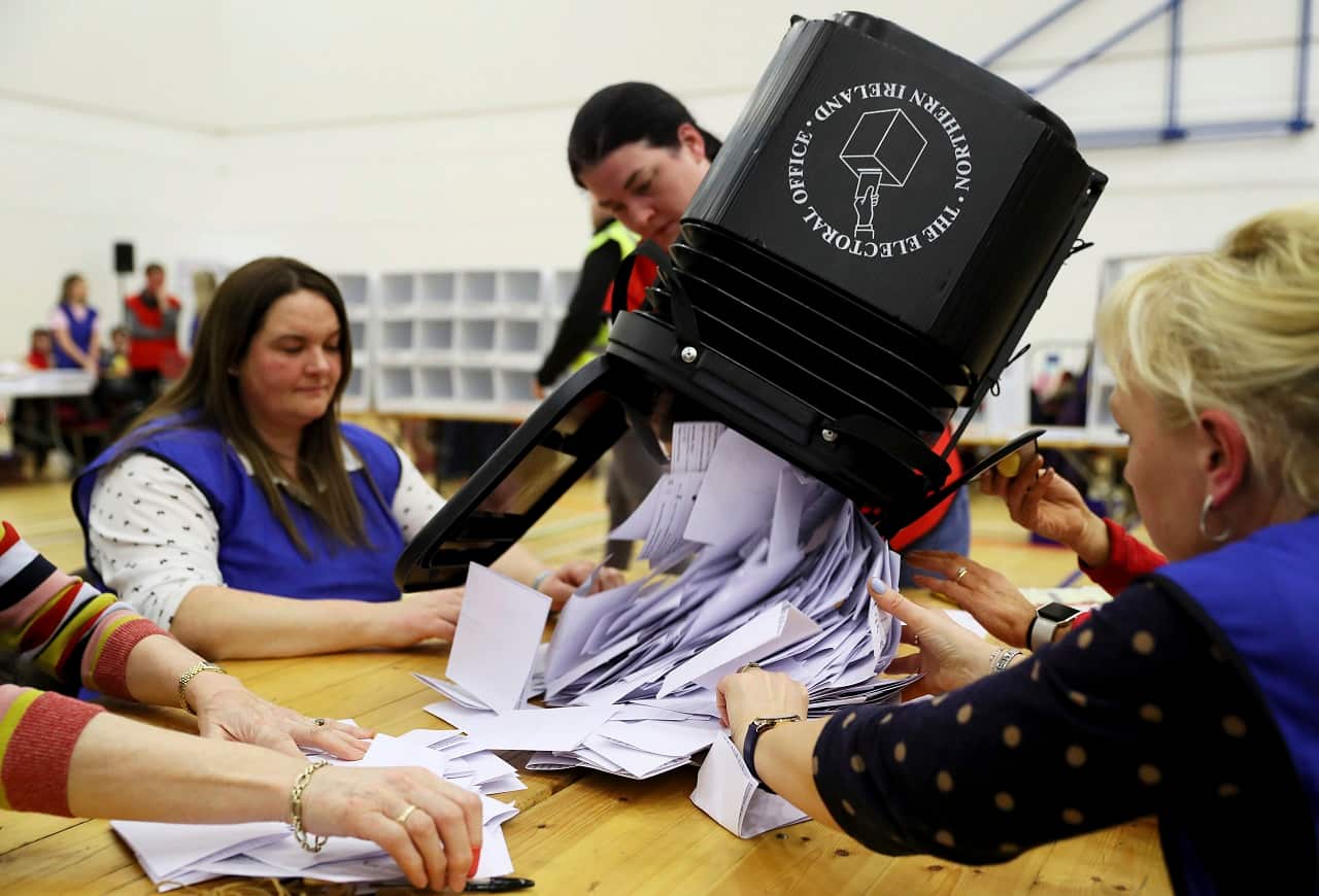 Ballot boxes are opened at the Leisure Centre, in Omagh, Northern Ireland.