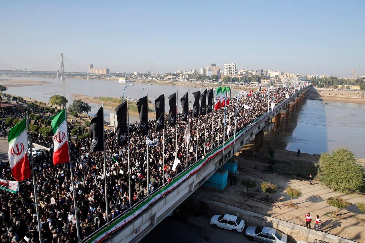 Iranians take part during the funeral ceremony for the slain general.
