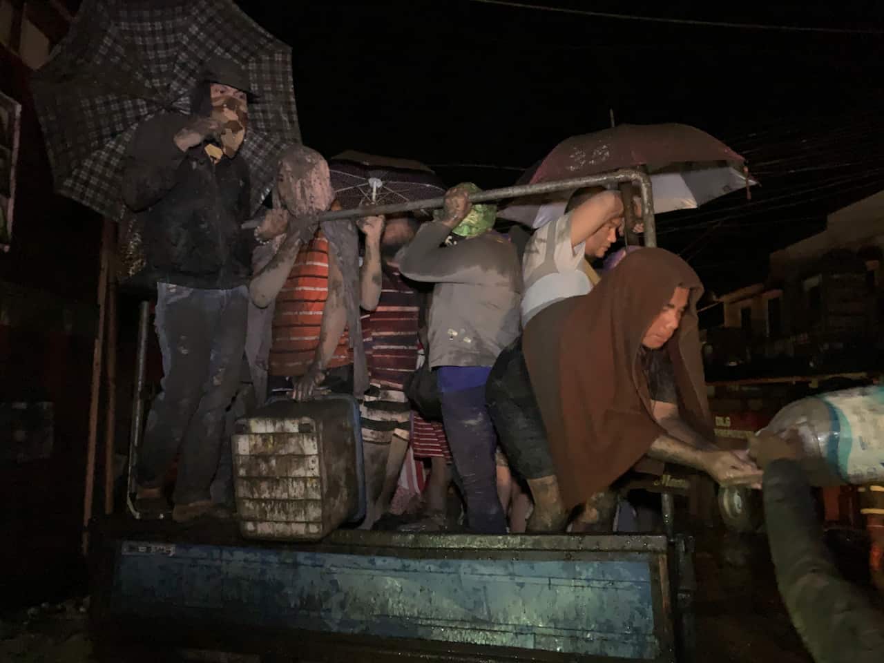 Villagers evacuate during Taal Volcano's eruption in Talisay, Batangas, Philippines