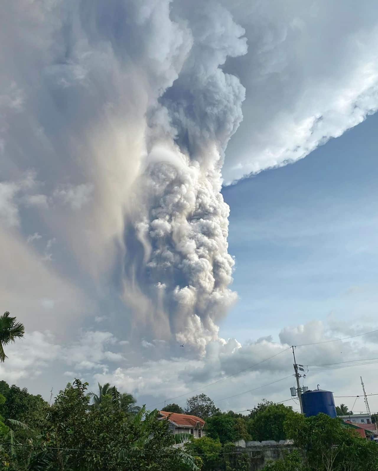 Tens of thousands of people have been evacuated and Manila's international airport was forced to shut down.