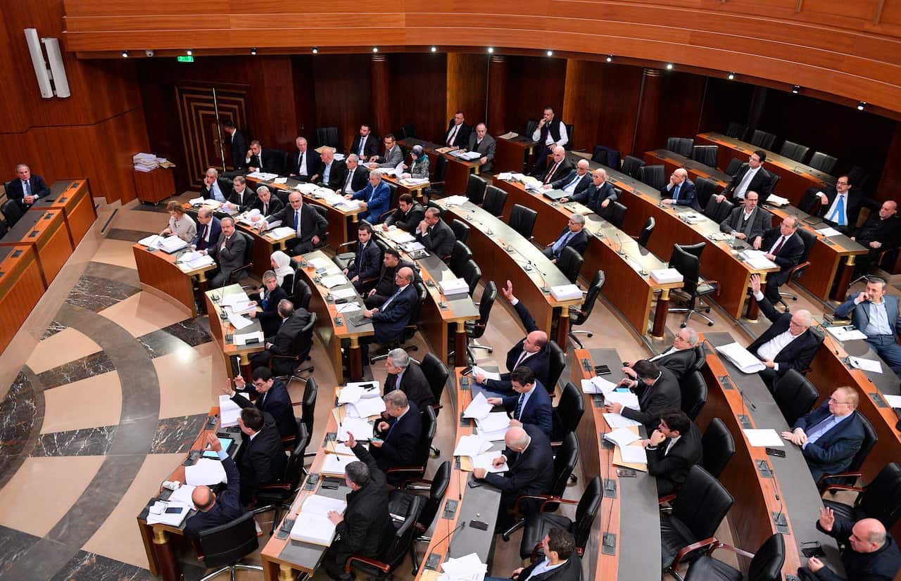 Lebanese lawmakers vote for the 2020 budget at the parliament, in Beirut