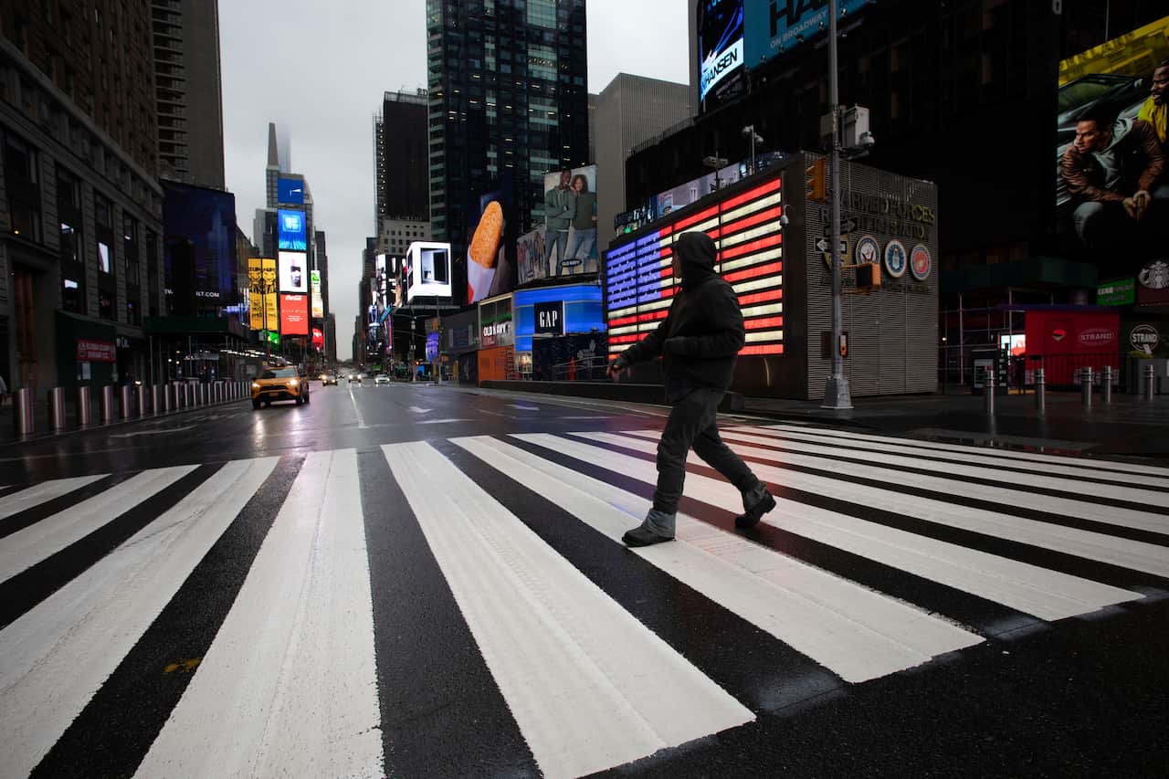  Andrew Cuomo has ordered most New Yorkers to stay home from work to slow the coronavirus pandemic. (AP Photo/Mark Lennihan)