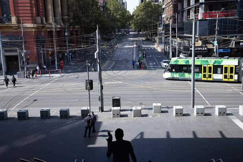 Melbourne streets are quiet as Australia shuts down non-essential services.