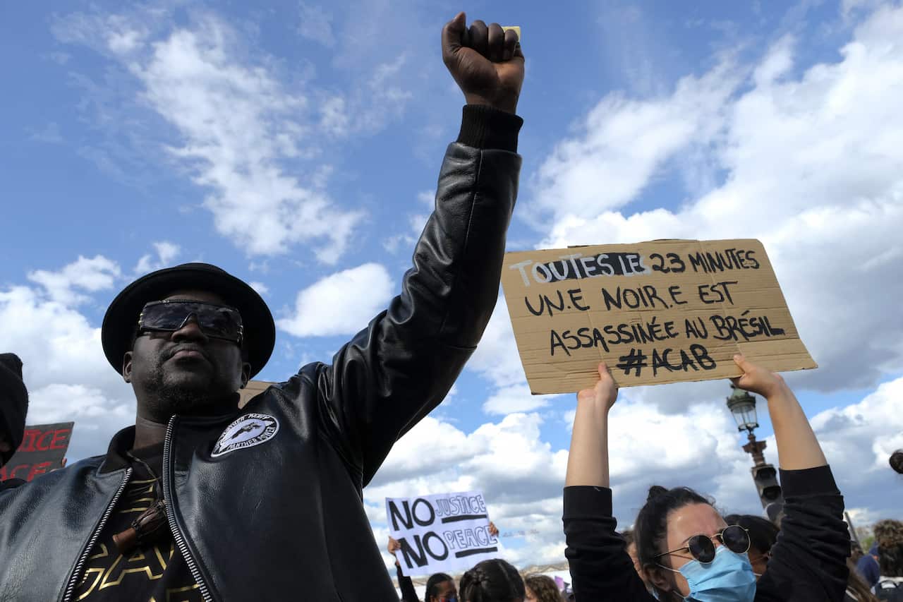 Protesters take part in a demonstration during a "Black Lives Matter" rally in France.