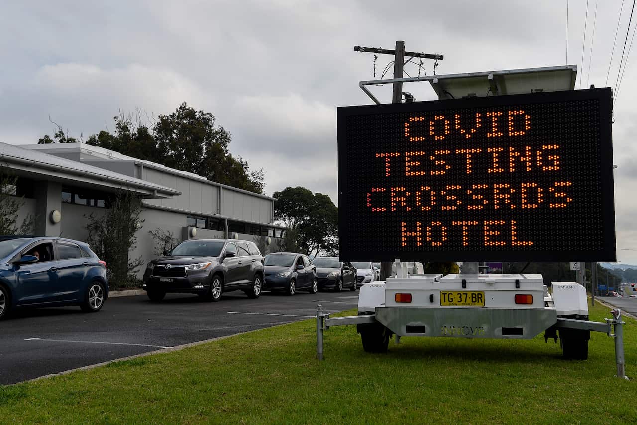 A COVID-19 testing alert sign at the Crossroads Hotel testing centre  in Sydney.