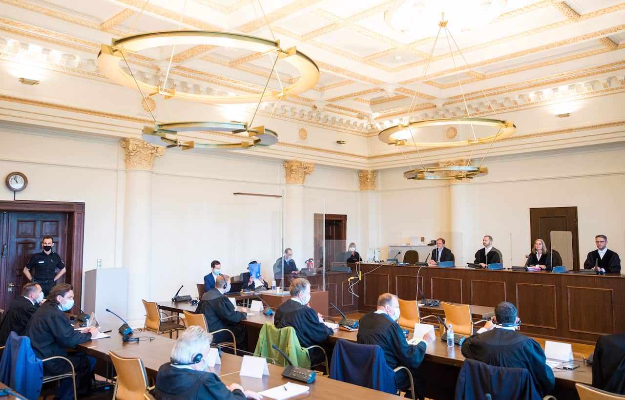 93-year-old former SS camp guard Bruno D. (L-C) of the Stutthof Nazi concentration camp near Danzig sits in the Regional Court in Hamburg, Germany