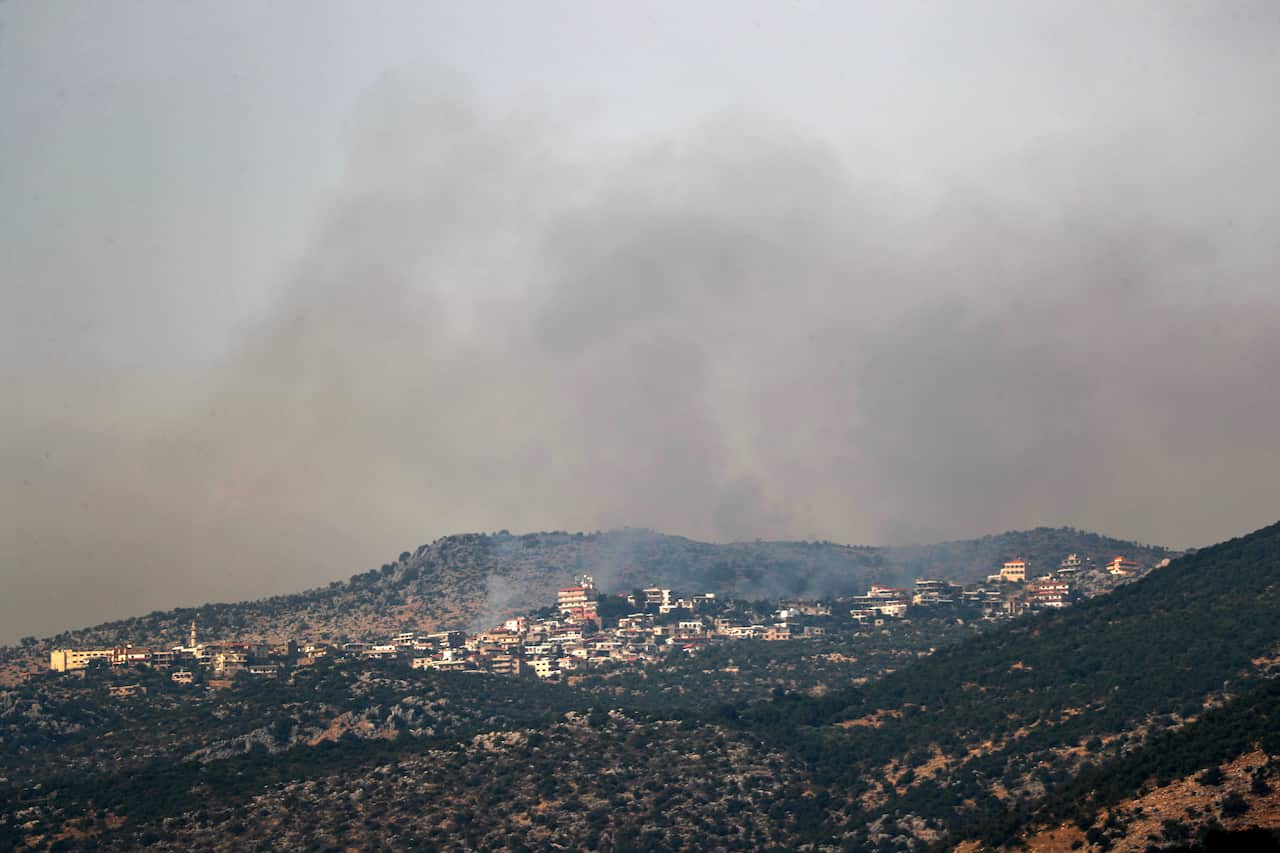 Smoke rises on the Lebanon side of the border after Israeli artillery shelling in response to an attempted Hezbollah attack on the Israeli-Lebanon border.