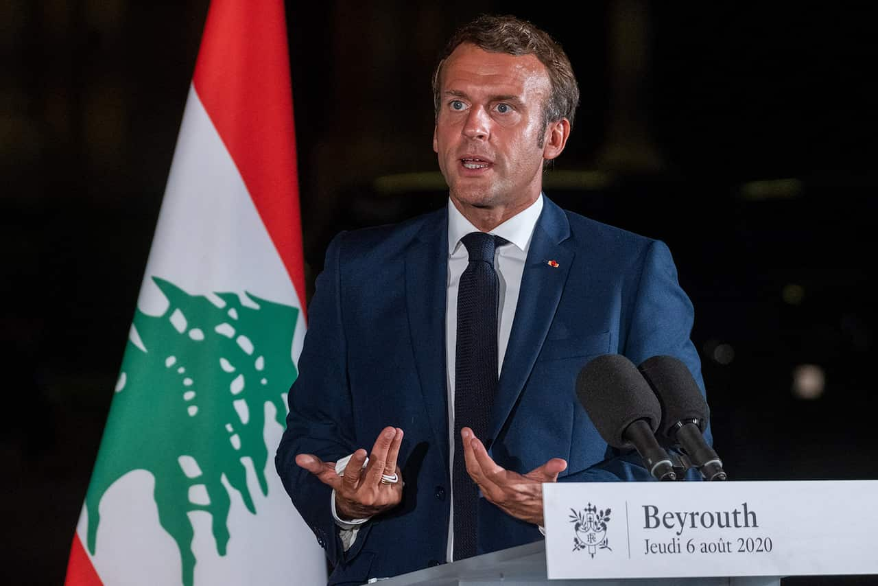 French president Emmanuel Macron talks during a press conference in Beirut. 