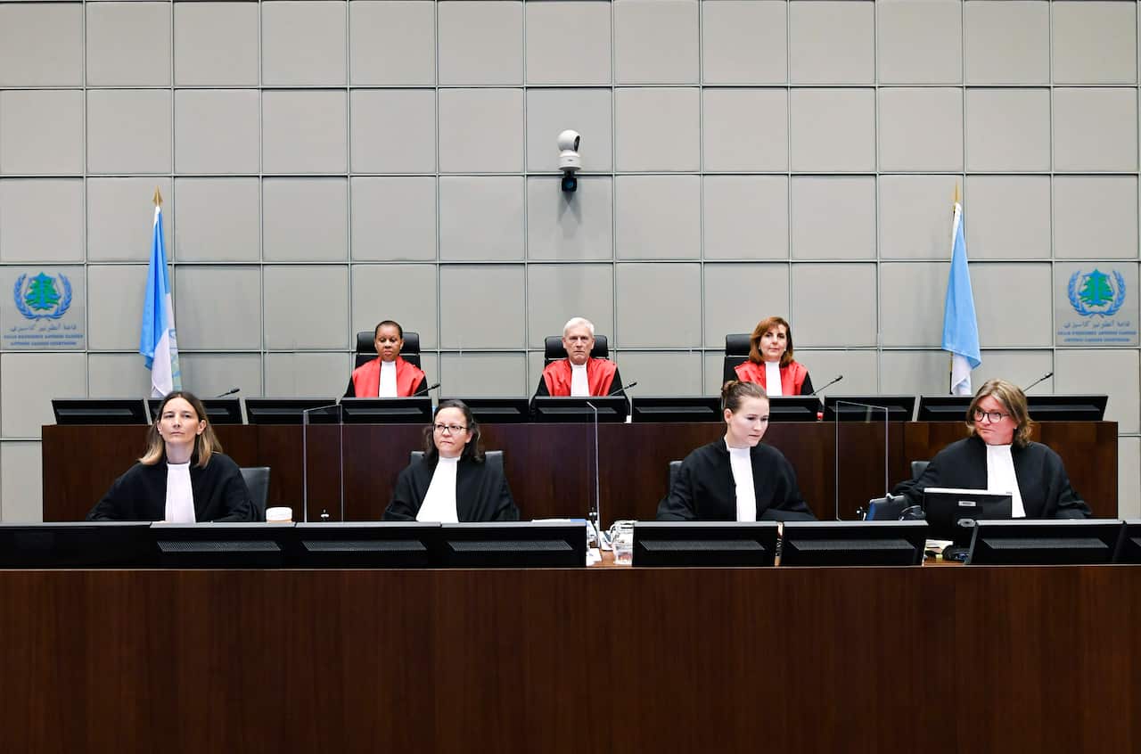 Judge David Re, Presiding Judge, Judge Janet Nosworthy  and Judge Micheline Braidy attend a session of the United Nations-backed Lebanon Tribunal. 