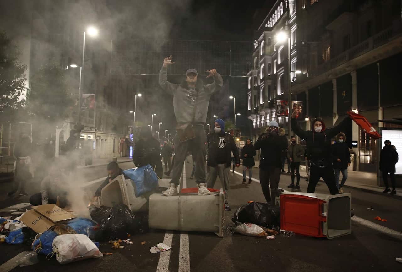 Protesters block the Gran Via street in Madrid, Spain.
