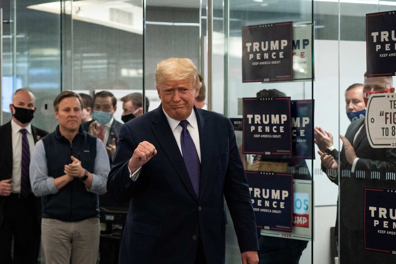 President Donald Trump arrives at campaign headquarters on election day. 