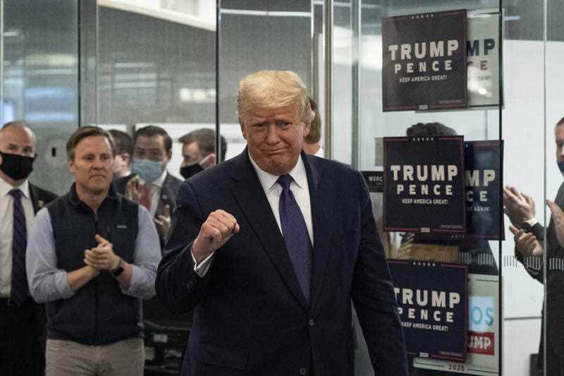 President Donald Trump arrives to speak at the Trump campaign headquarters on Election Day.