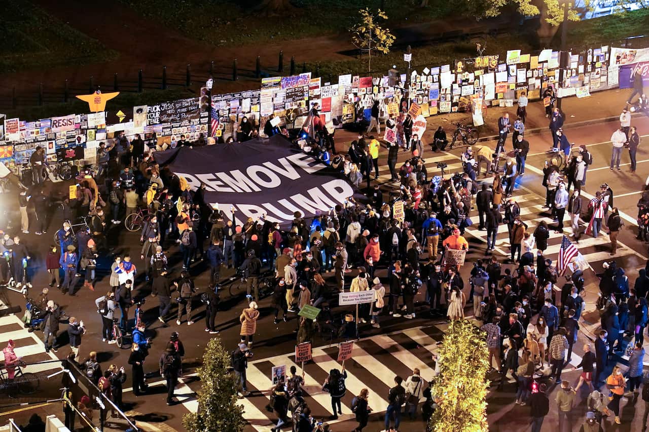 People gather in Black Lives Matter Plaza near White House on election day. 