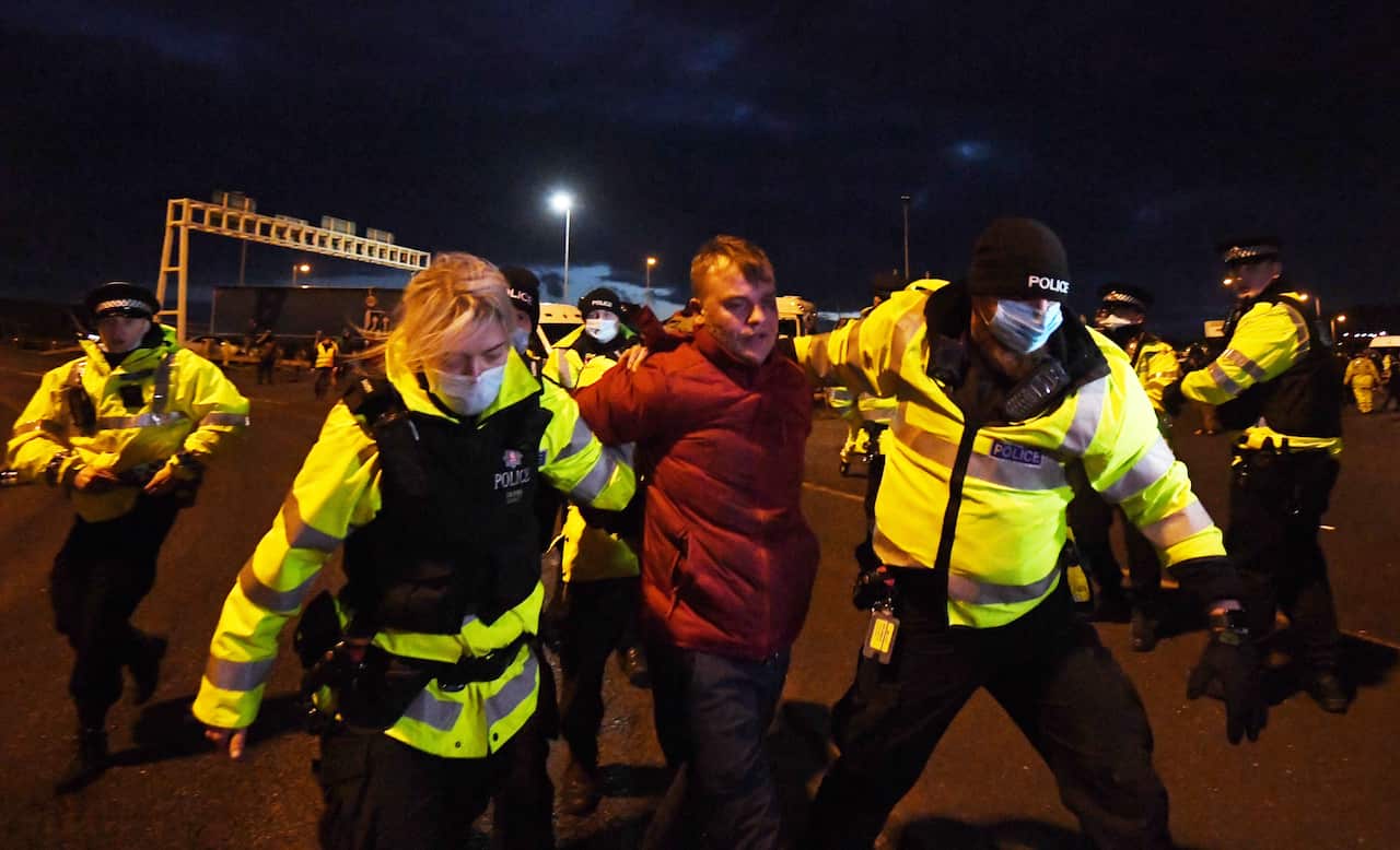 A man is being arrested at the entrance of the Port of Dover.
