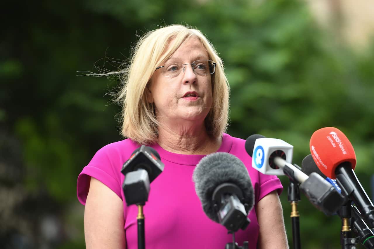 Victoria Police Minister Lisa Neville addresses the media during a press conference in Melbourne.