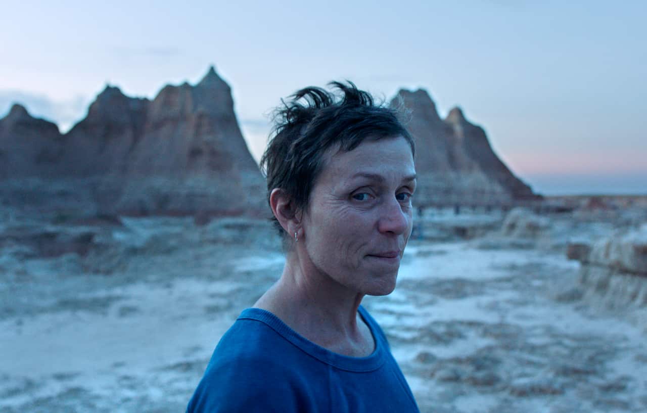 This image released by Searchlight Pictures shows Frances McDormand in a scene from the film "Nomadland."