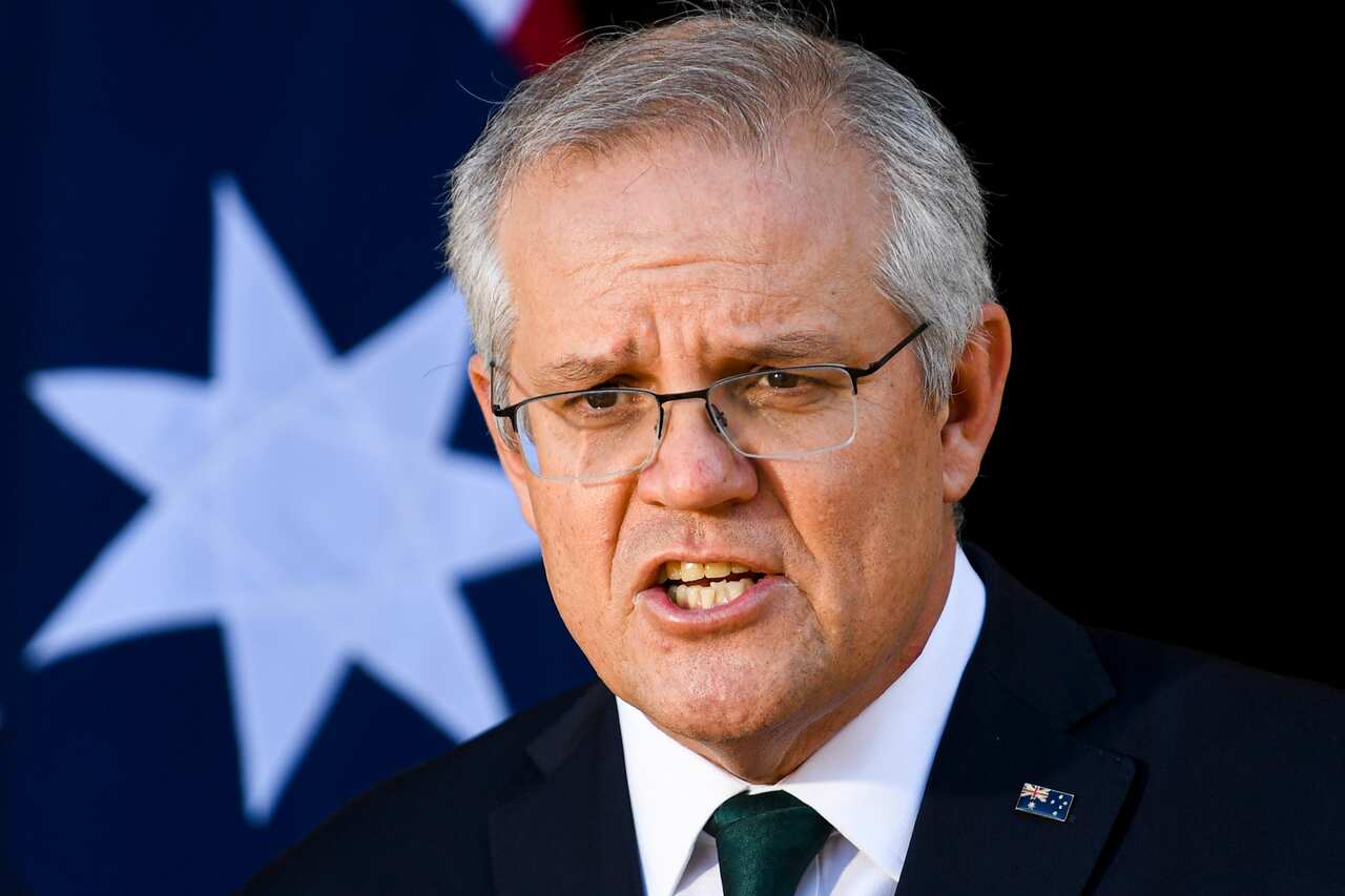 Prime Minister Scott Morrison speaks to the media during a press conference at the Lodge in Canberra.