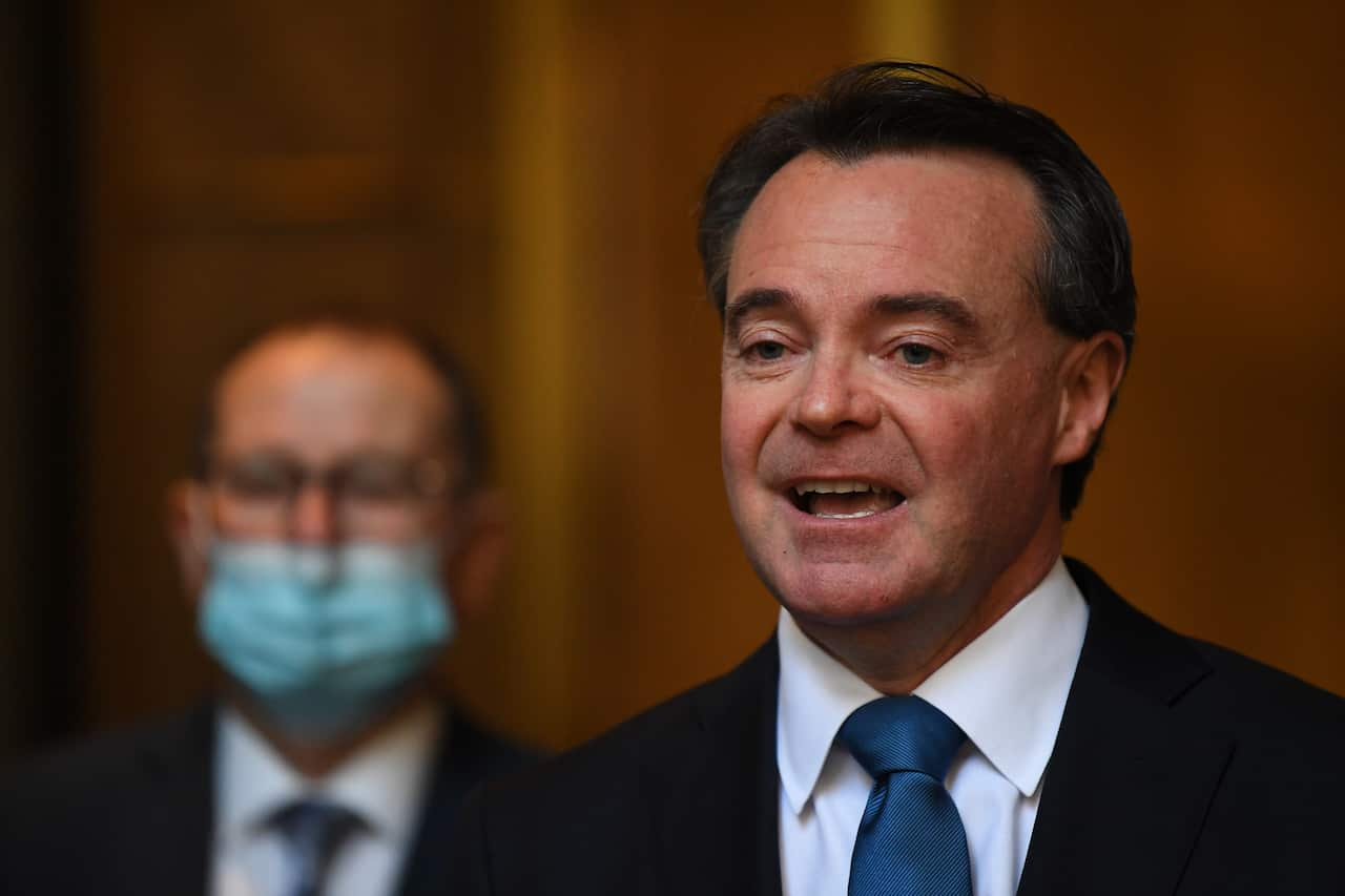 Former Victorian Liberal leader Michael O'Brien (right) speaks to media following the party room meeting in Melbourne