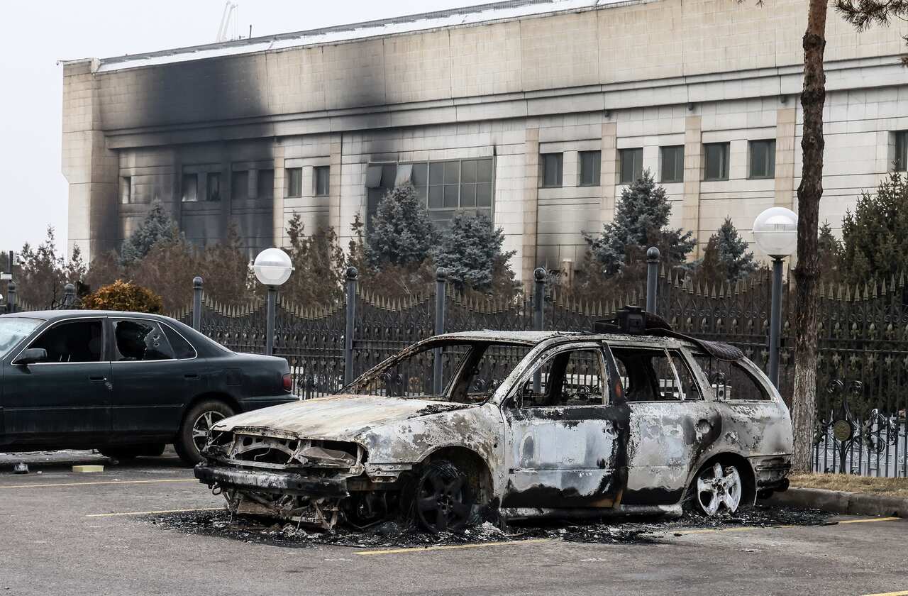 The wreckage of a car left near the presidential residence.