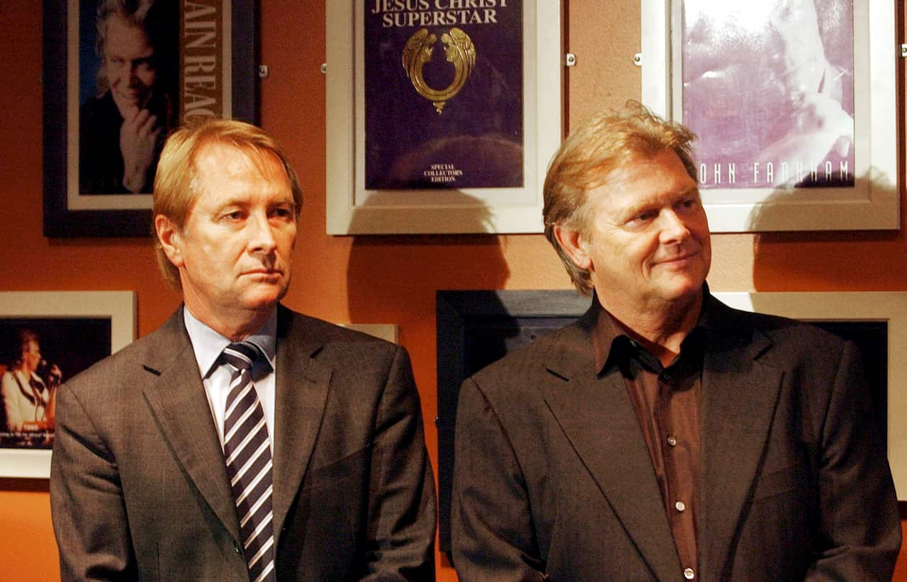 Glenn Wheatley, left, pictured with singer John Farnham in Sydney in 2002.