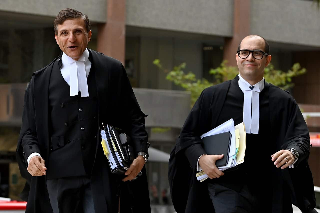 Arthur Moses (left), barrister for Ben Roberts-Smith, arrives at the Federal Court in Sydney, Monday, February 7, 2022.