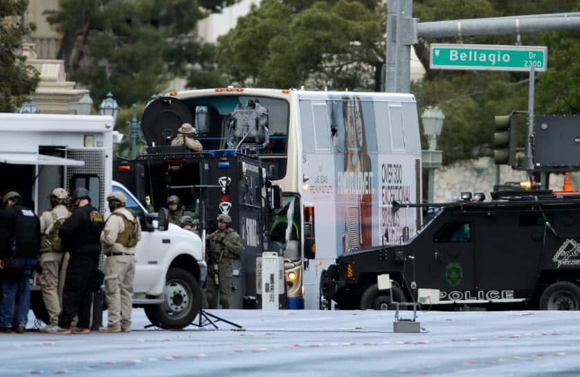 Las Vegas SWAT officers surround a bus along Las Vegas Boulevard