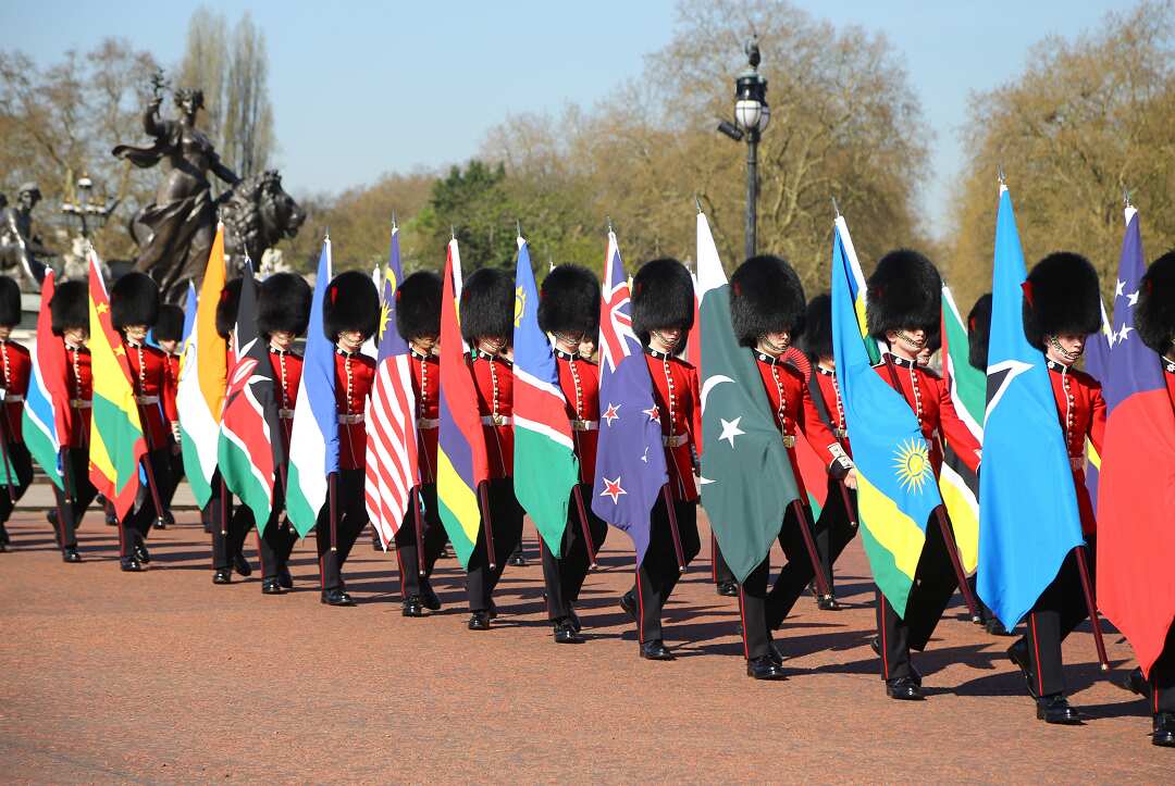 Coldstream Guards carrying flags of 53 Commonwealth countries.