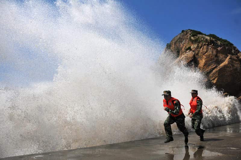 Huge waves surge up against the shoreline ahead of Typhoon Soulik.