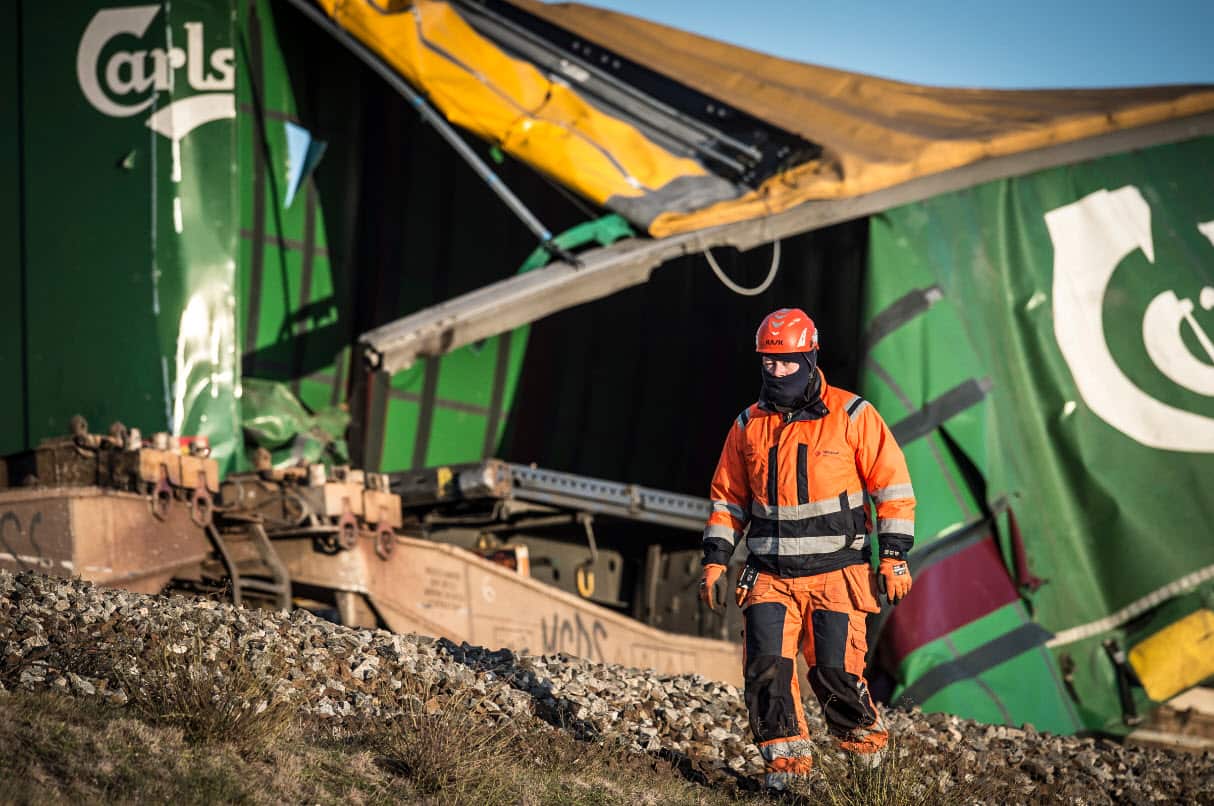 A member of the Danish emergency services at the scene following the train accident