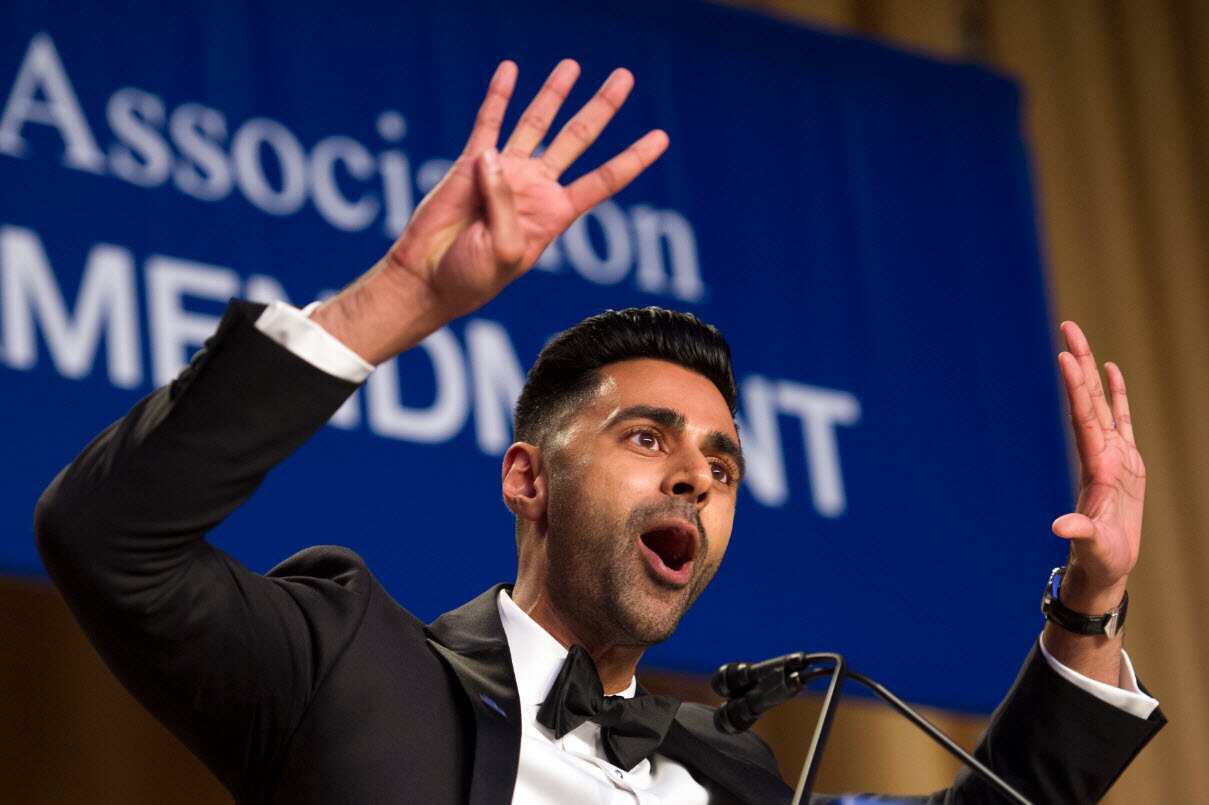 FILE: American comedian Hasan Minhaj entertains the guests at the White House Correspondents' Dinner in Washington