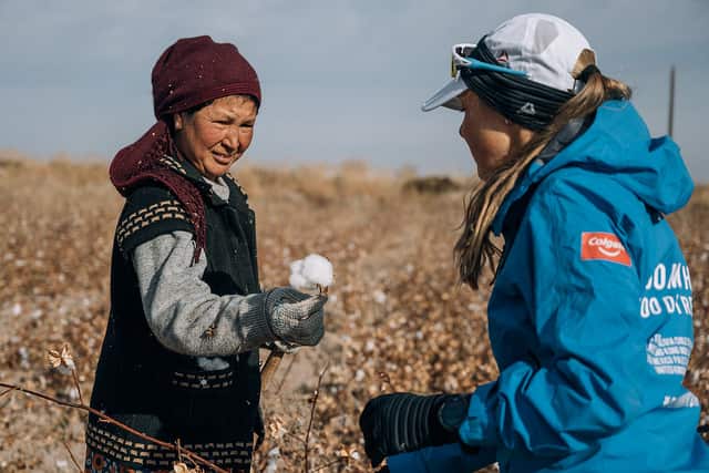 Mina Guli meets with local cotton picker in Uzbekistan.