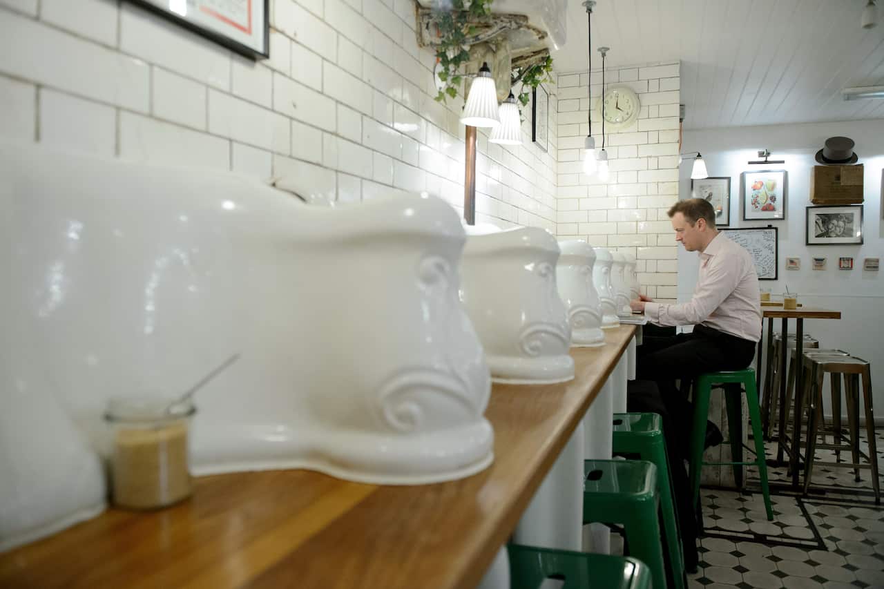 The Attendant cafe...With spiralling land prices turning even the darkest corners of London into potential goldmines, the city's forgotten spaces, including 19th-century public toilets, are blossoming into restaurants, cafes and boutiques. (Getty)