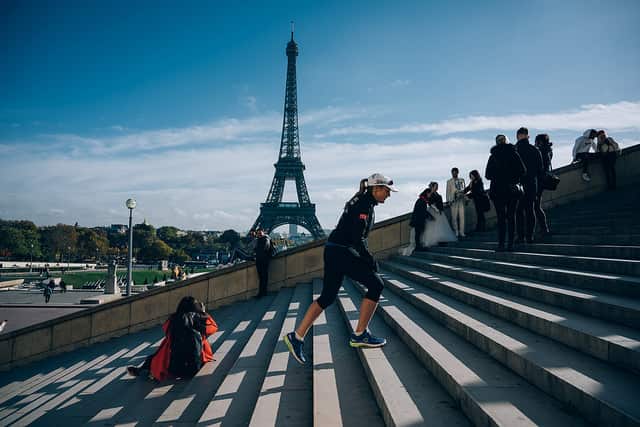 Mina Guli runs through Paris, France.