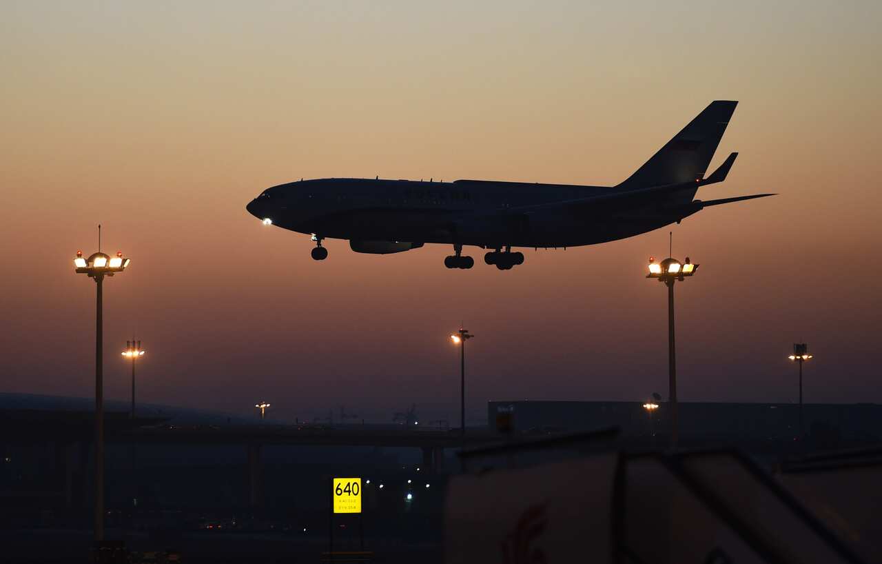 Russia's President Vladimir Putin's plane lands in Beijing for the APEC summit